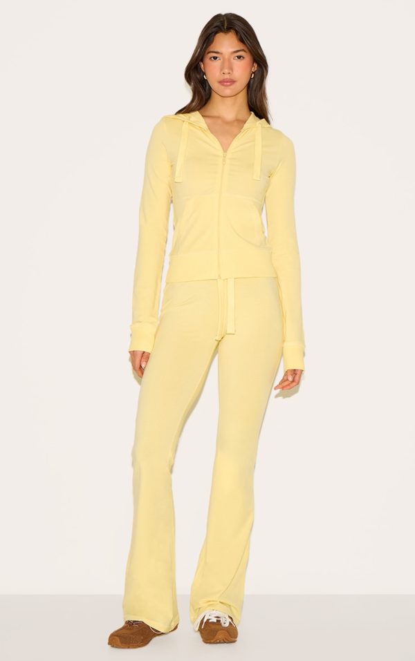 859153bfba4736c37e15bcb9f5803281dee3da49_CNN0622_1_butter_yellow_low_rise_skinny_flare_trousers