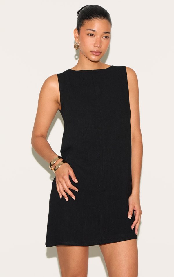 fb12ae16665382a7a6f8e8813ef6b70ace2fce14_CNN3121_1_black_textured_boat_neck_boxy_shift_dress